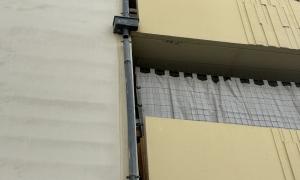 Pose de descente de gouttière zinc sur un bâtiment  à Montaudran 